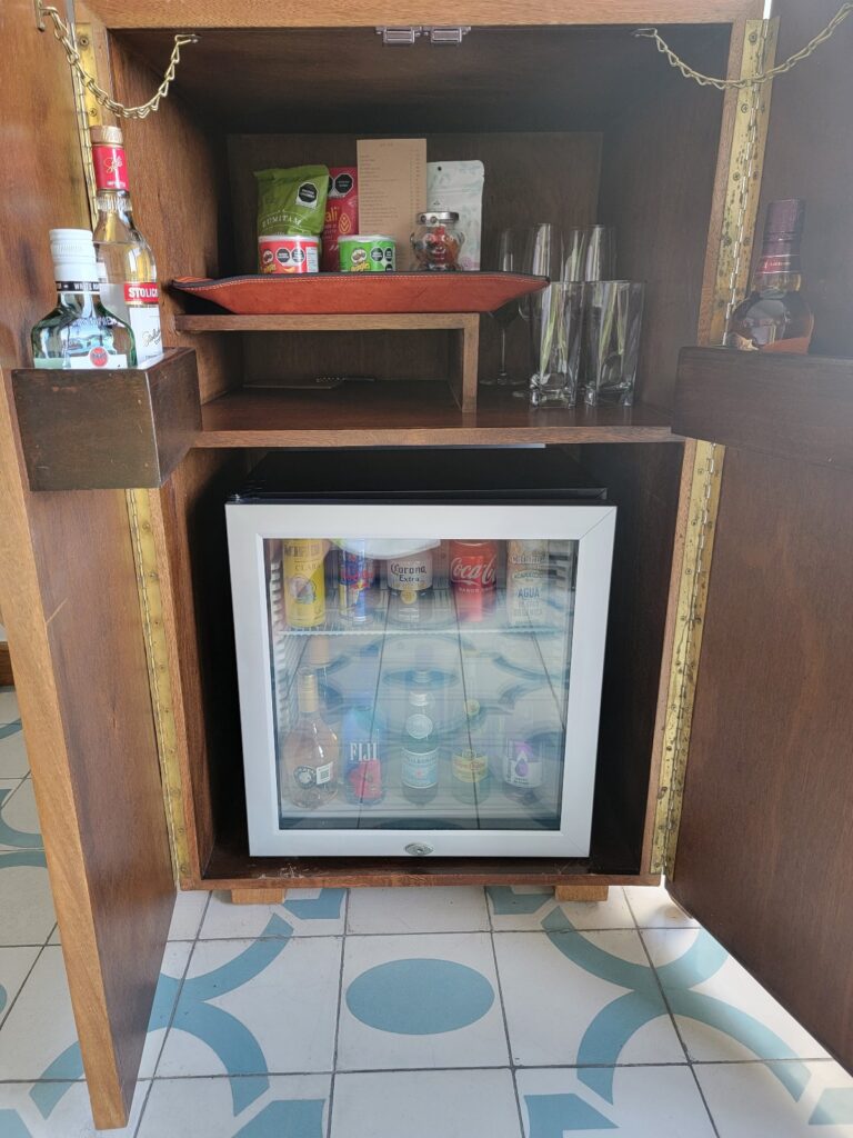 a glass cabinet with a glass display