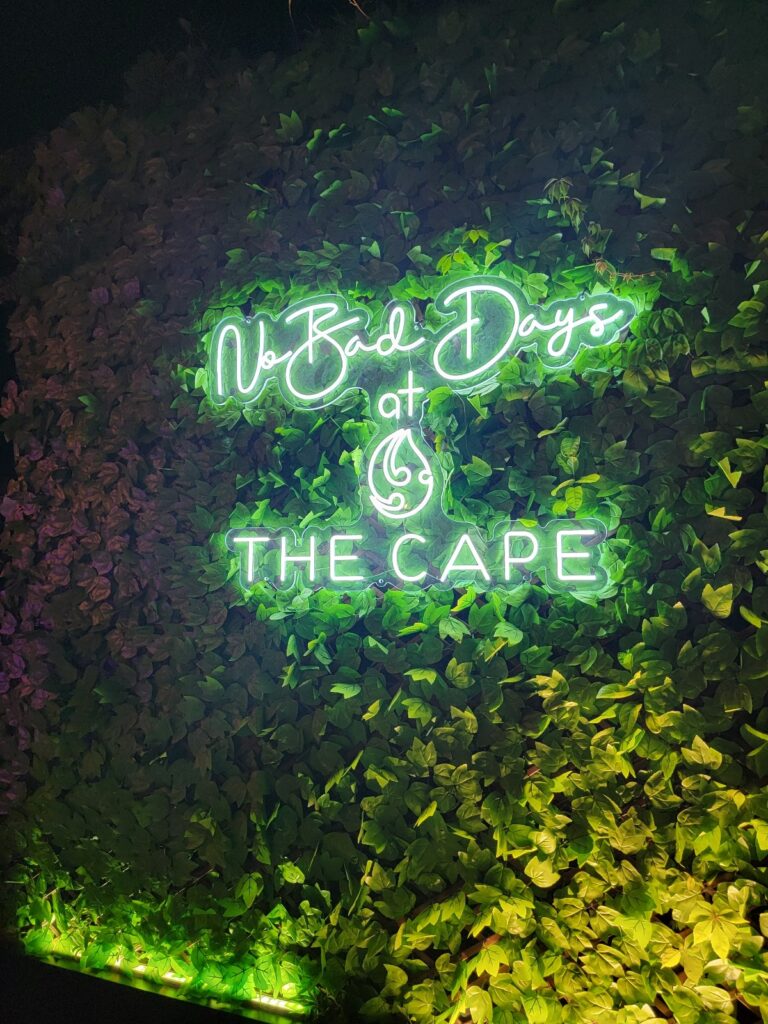 a green sign with white text