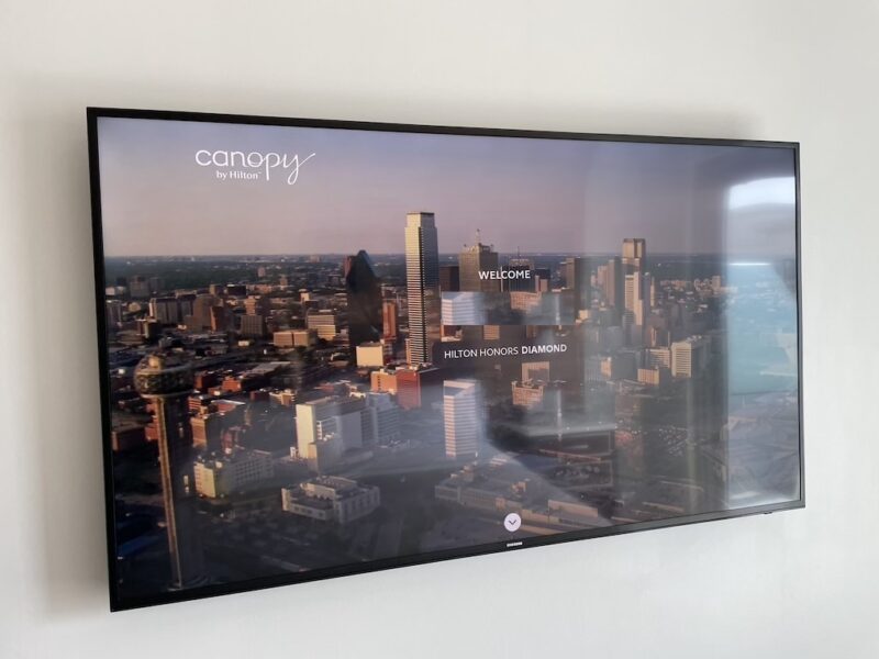 a computer monitor with a city skyline