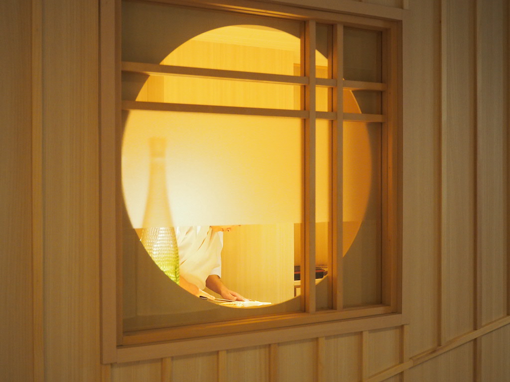 a person lying in a window