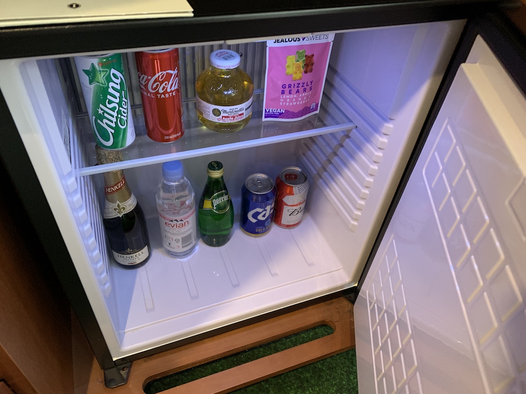 a refrigerator with drinks and food