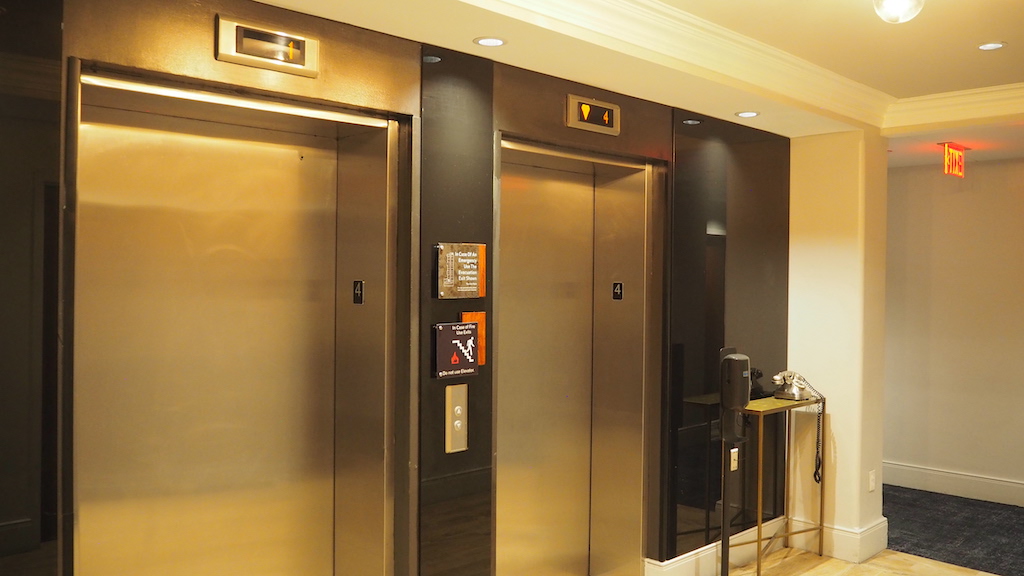 a row of elevator doors