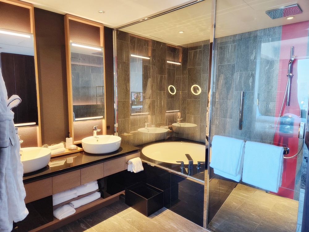 a bathroom with a large glass shower
