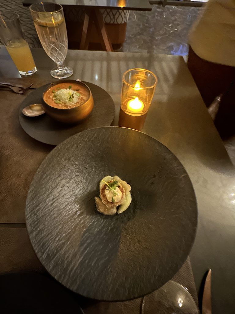 a table with food and candles on it