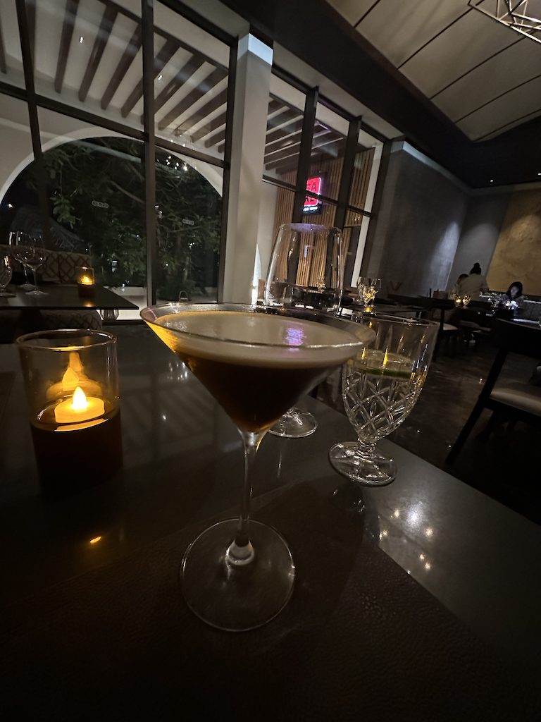 a group of wine glasses on a table