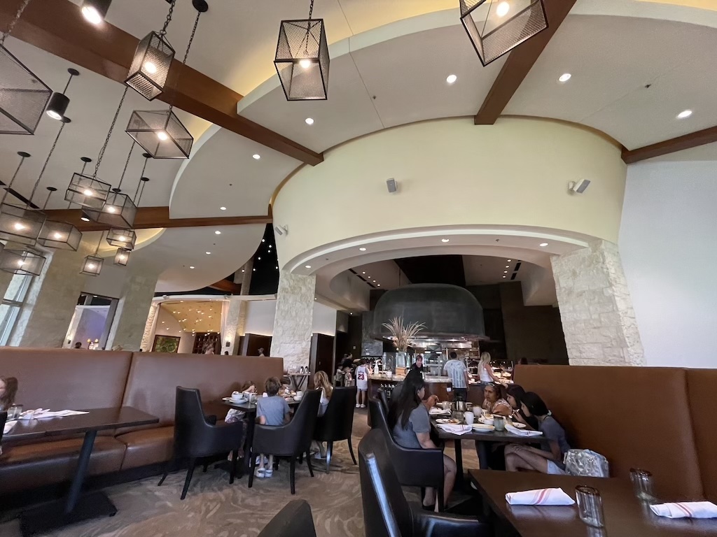 a group of people sitting at tables