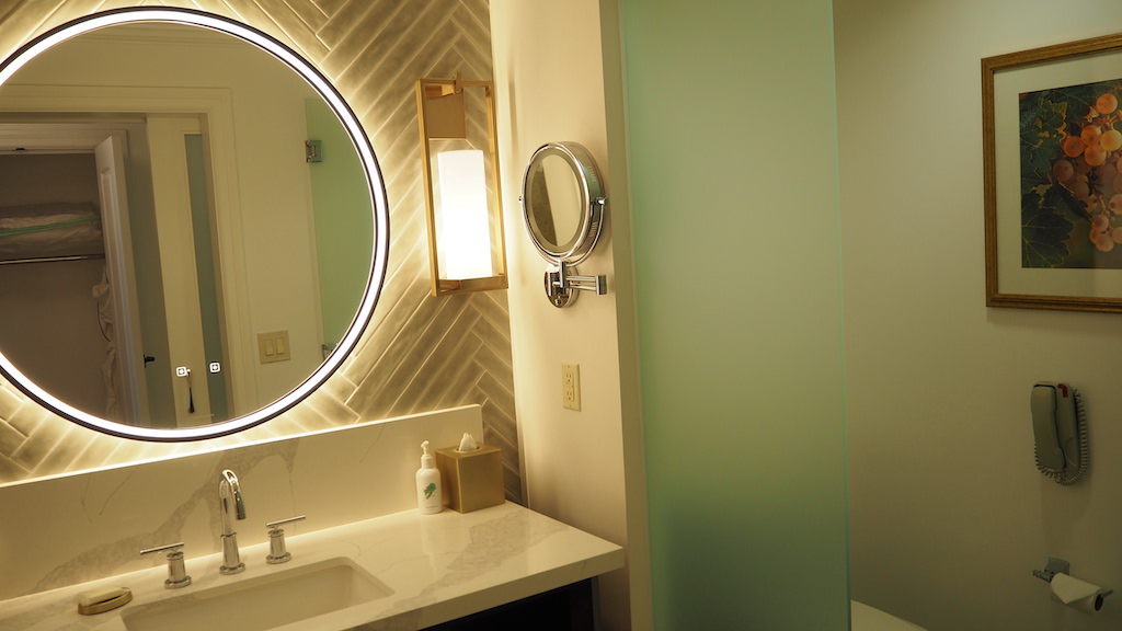 a bathroom with a large mirror