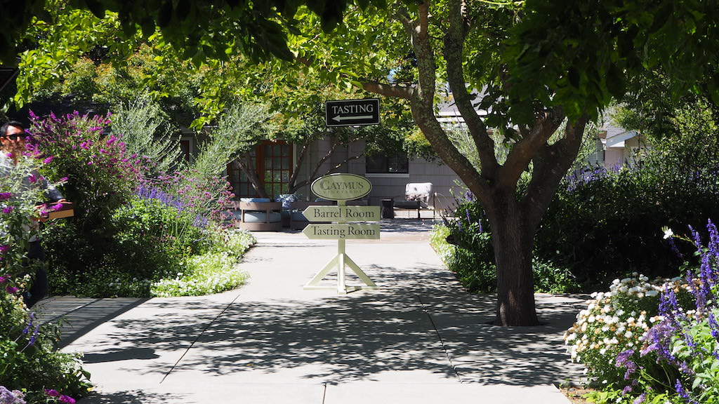 a sign in a garden