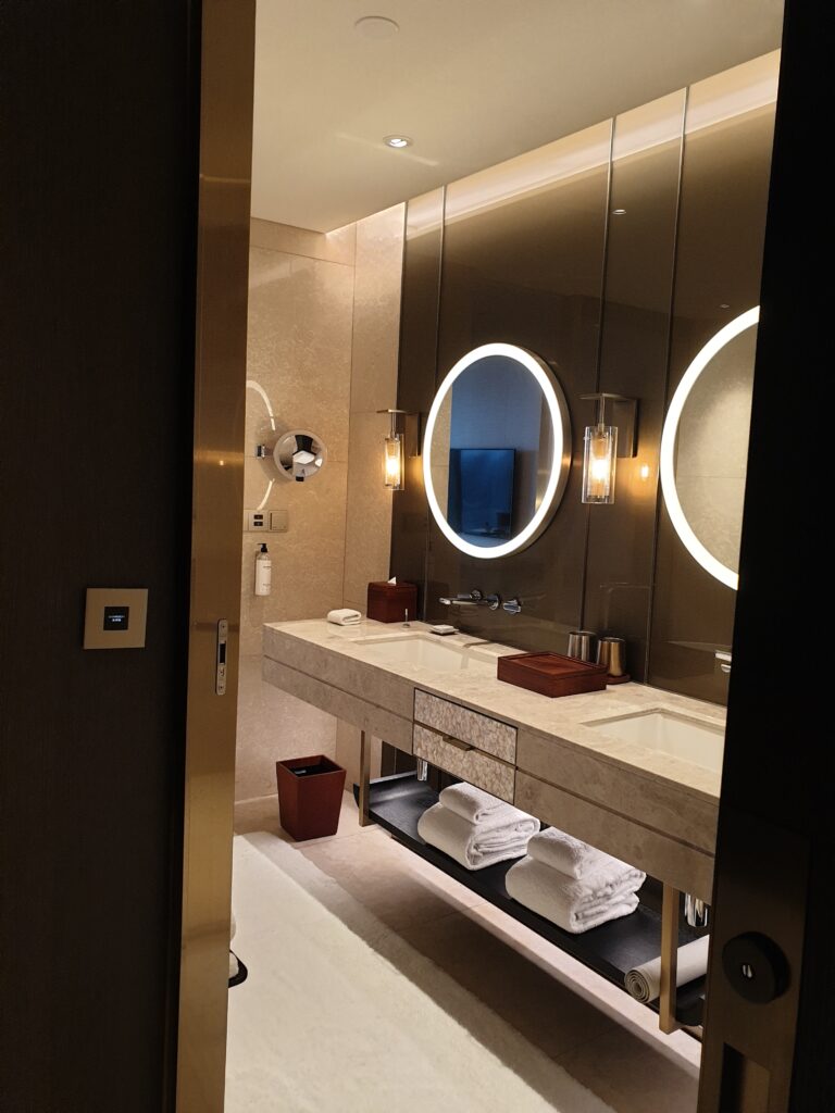 a bathroom with a large mirror