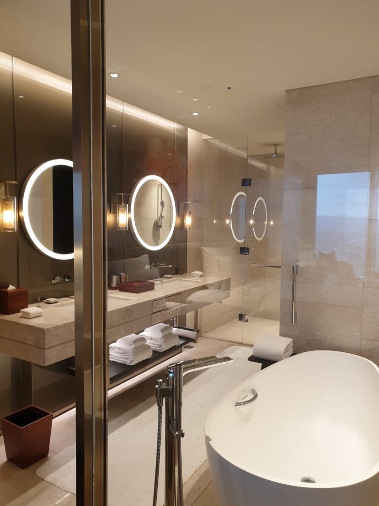 a bathroom with a large mirror