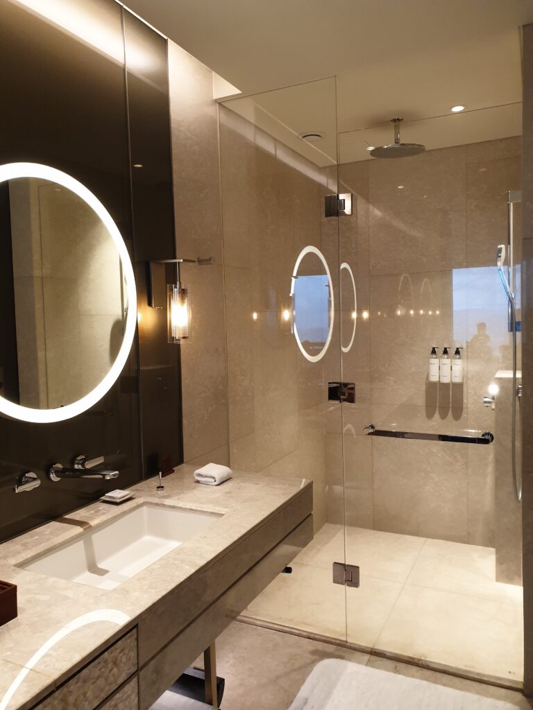 a bathroom with a large mirror