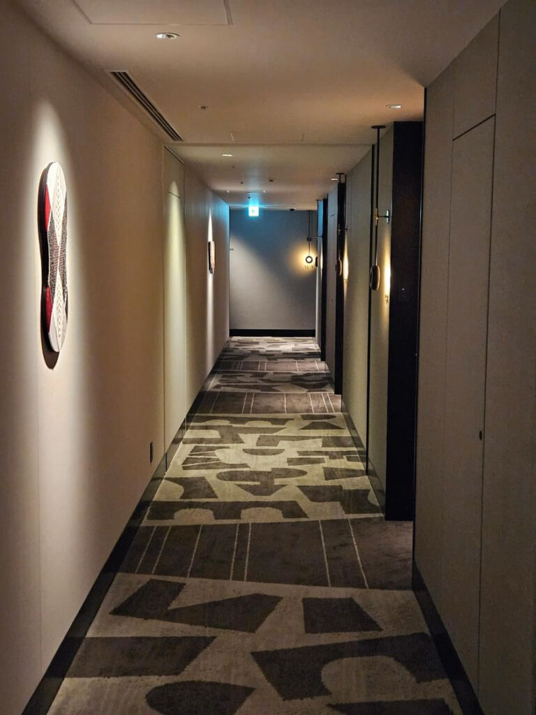 a hallway with a tile floor