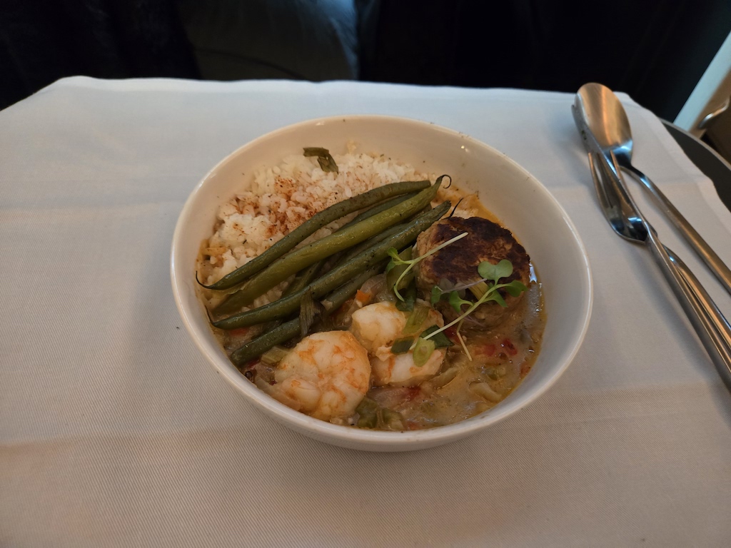 a bowl of soup with a spoon