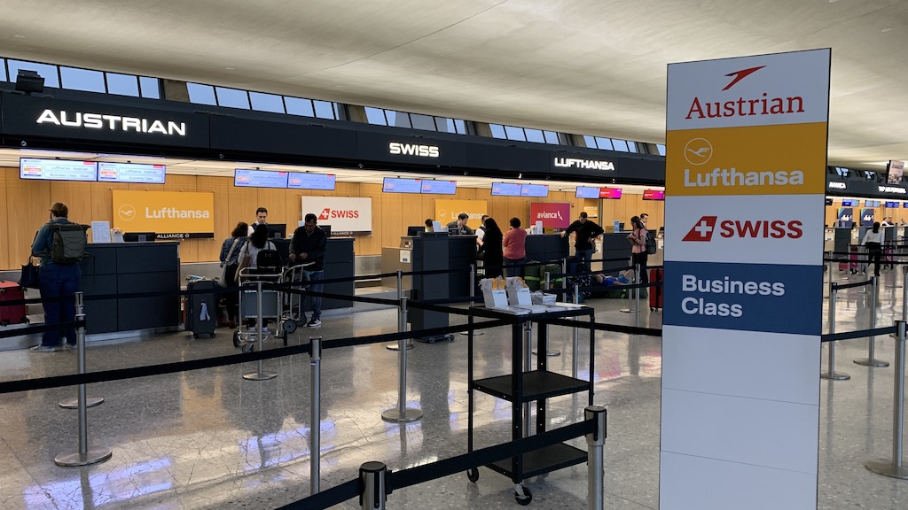 a group of people in a large airport