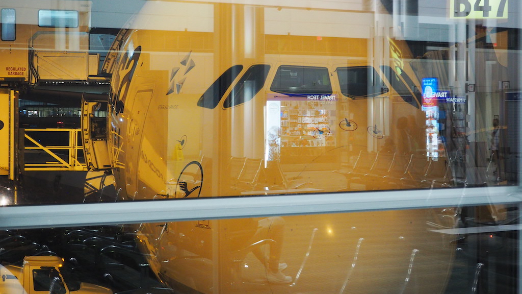 a yellow school bus in a window