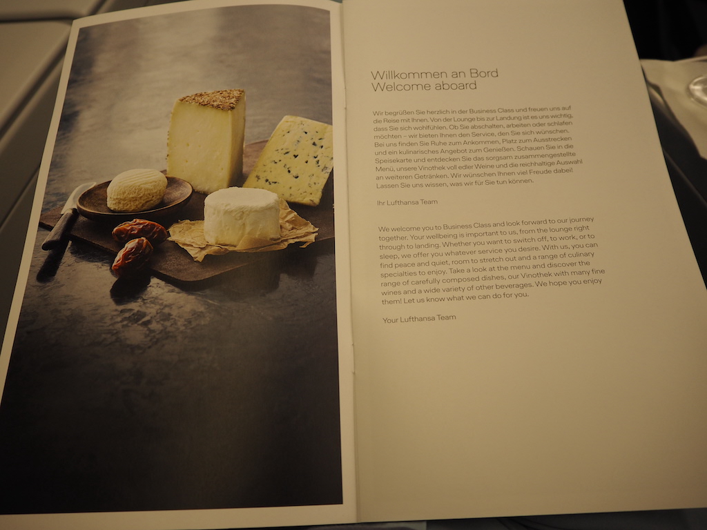 a book with a picture of a rock and a rock on a table