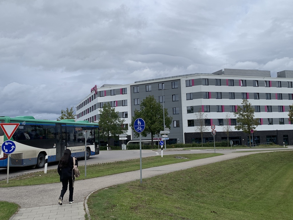 a bus parked in front of a building