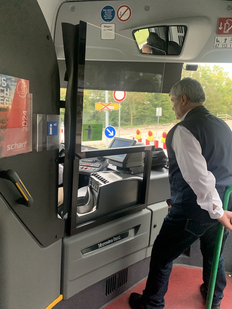 a person standing in a bus