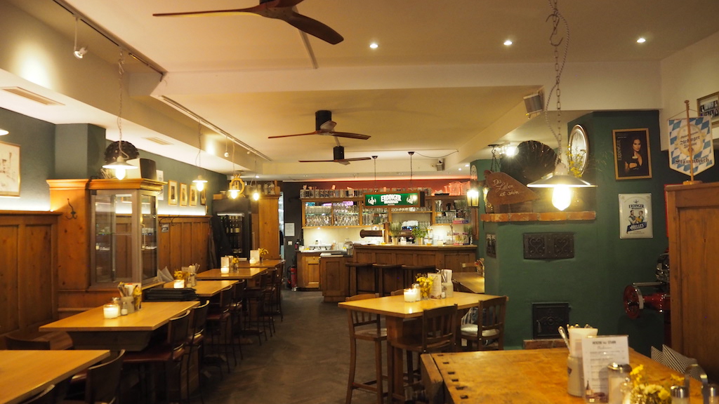 a restaurant with tables and chairs