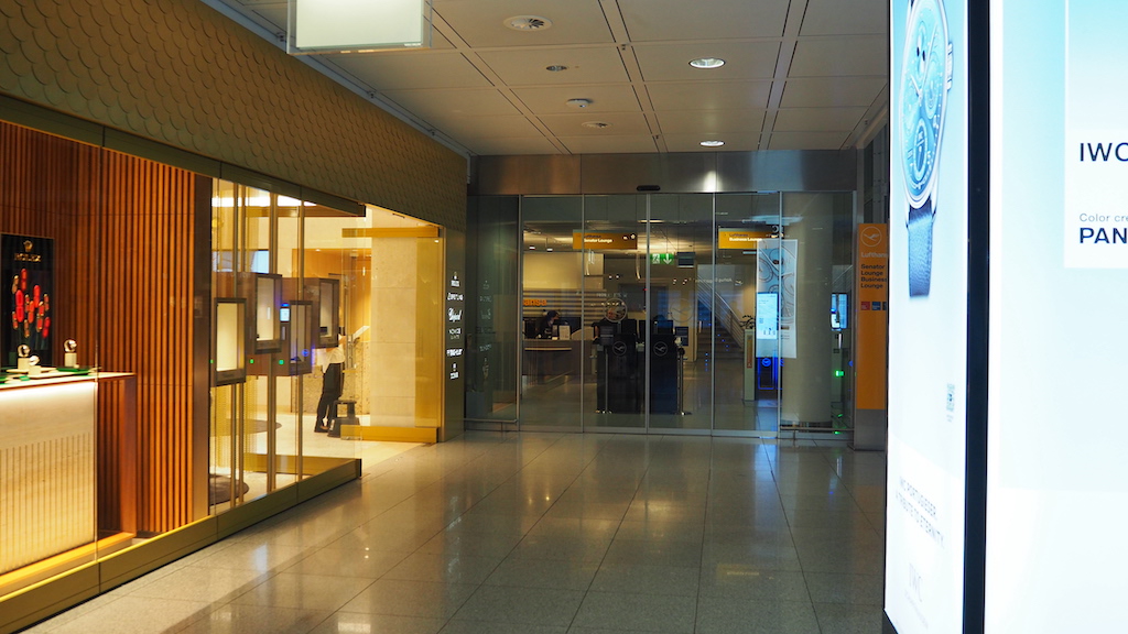 a long hallway with glass doors