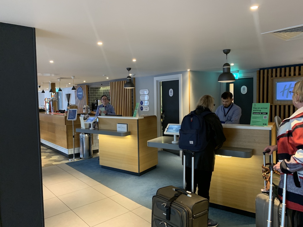 people waiting at a counter