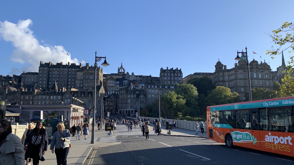 a bus travels down the street