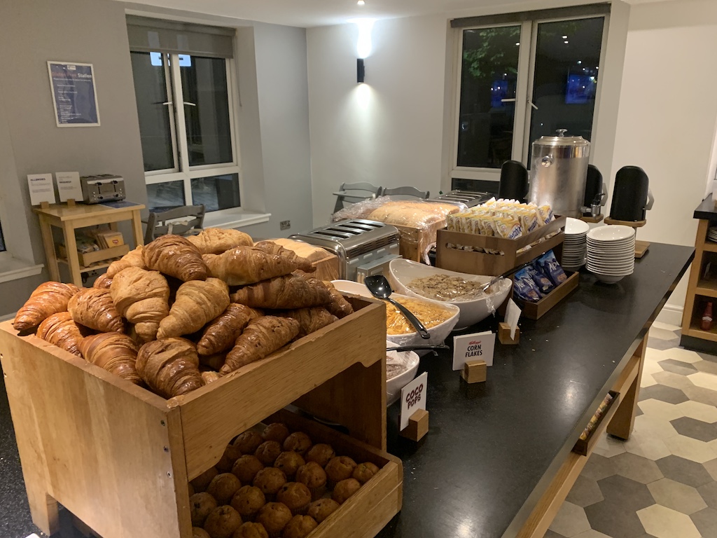 a room with many bags of bread