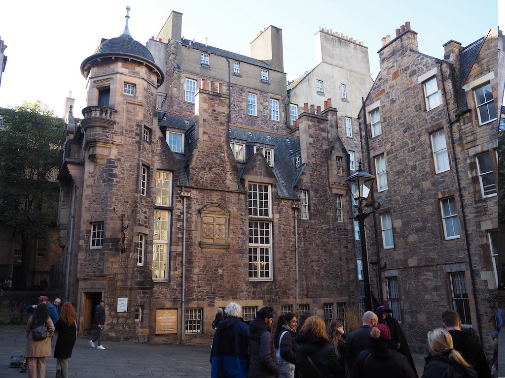 a group of people outside of a building