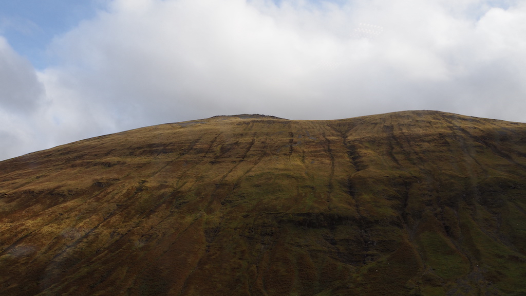 a large green hill