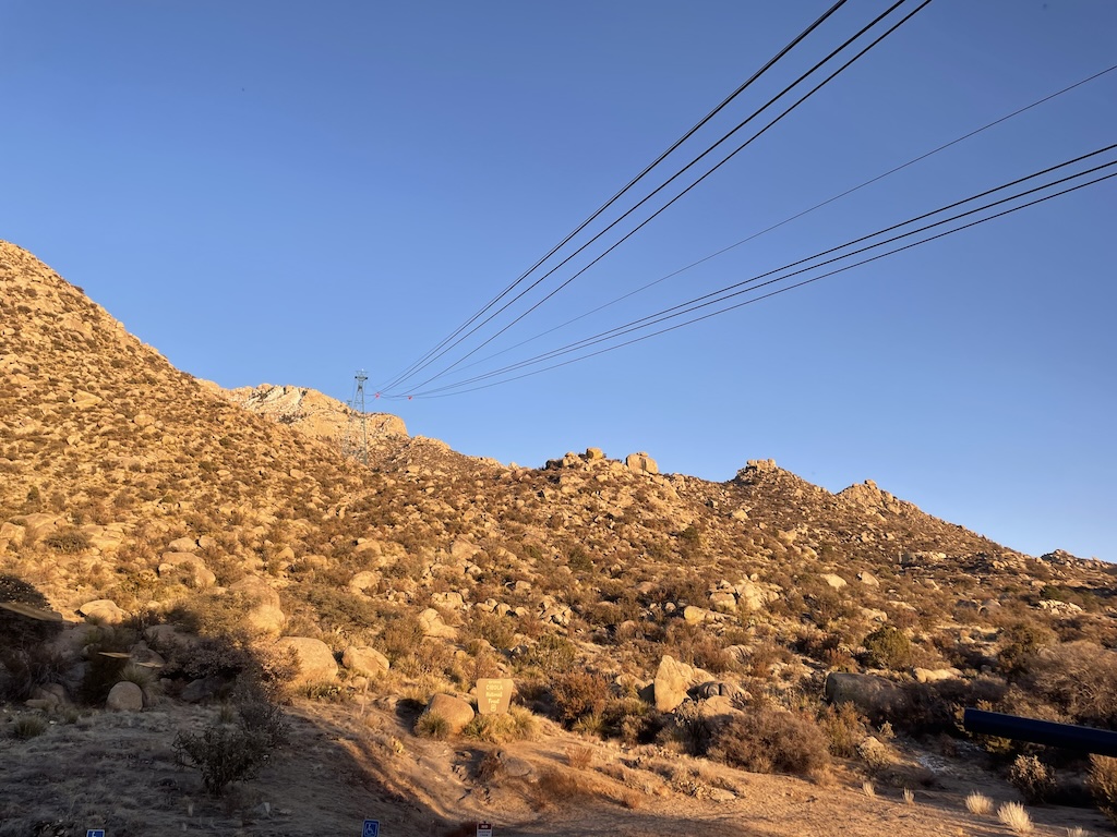 a hill with a wire fence