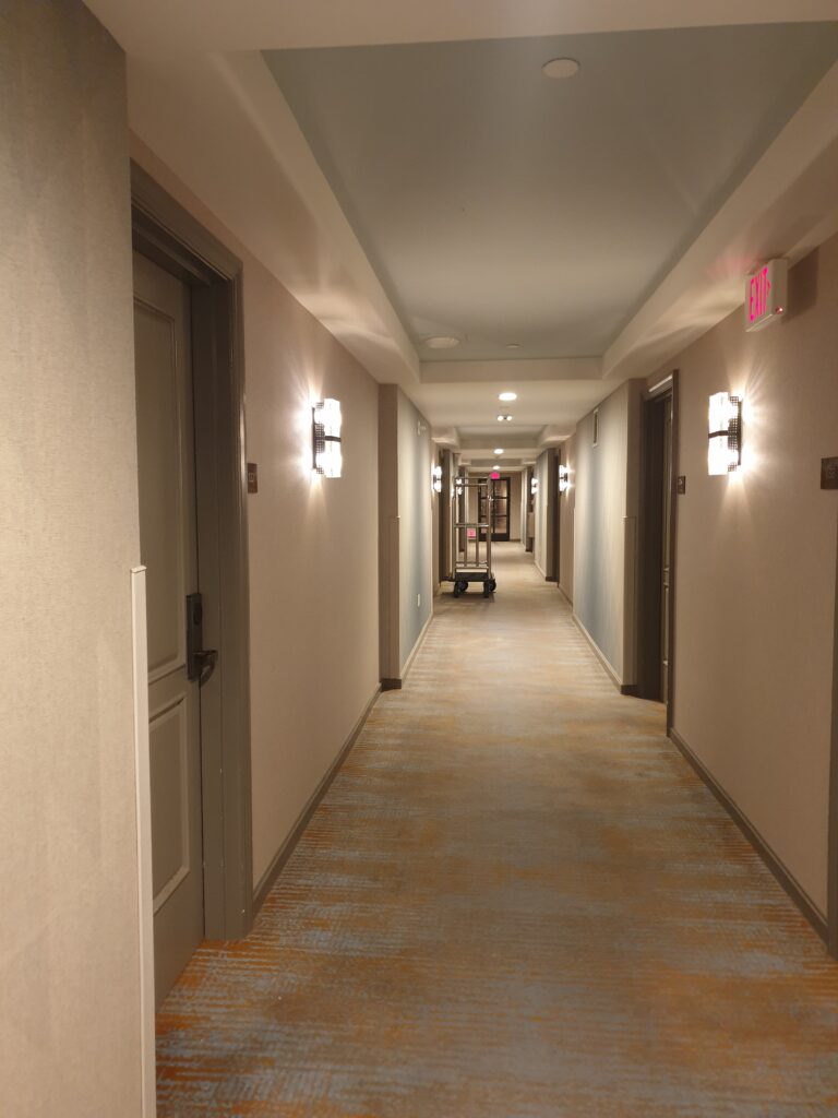 a long hallway with doors