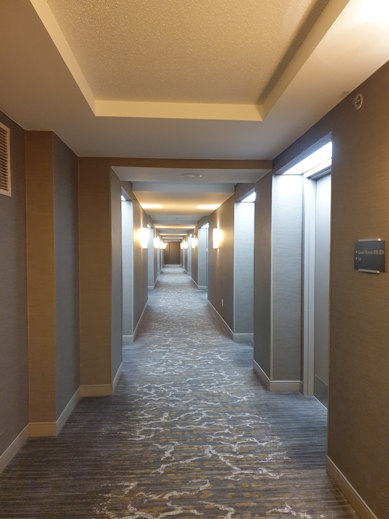 a long hallway with doors