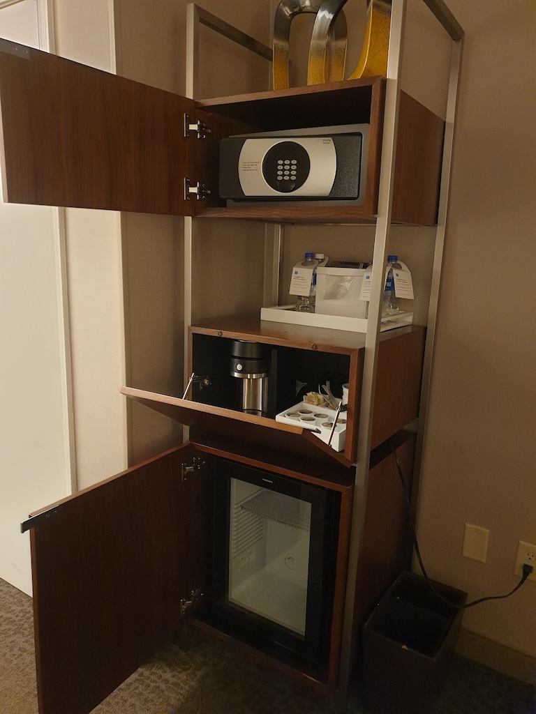 a microwave oven on a shelf