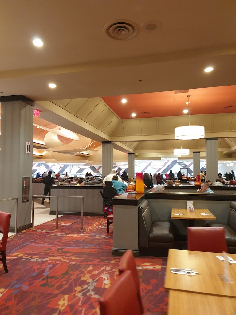 a group of people sitting at tables