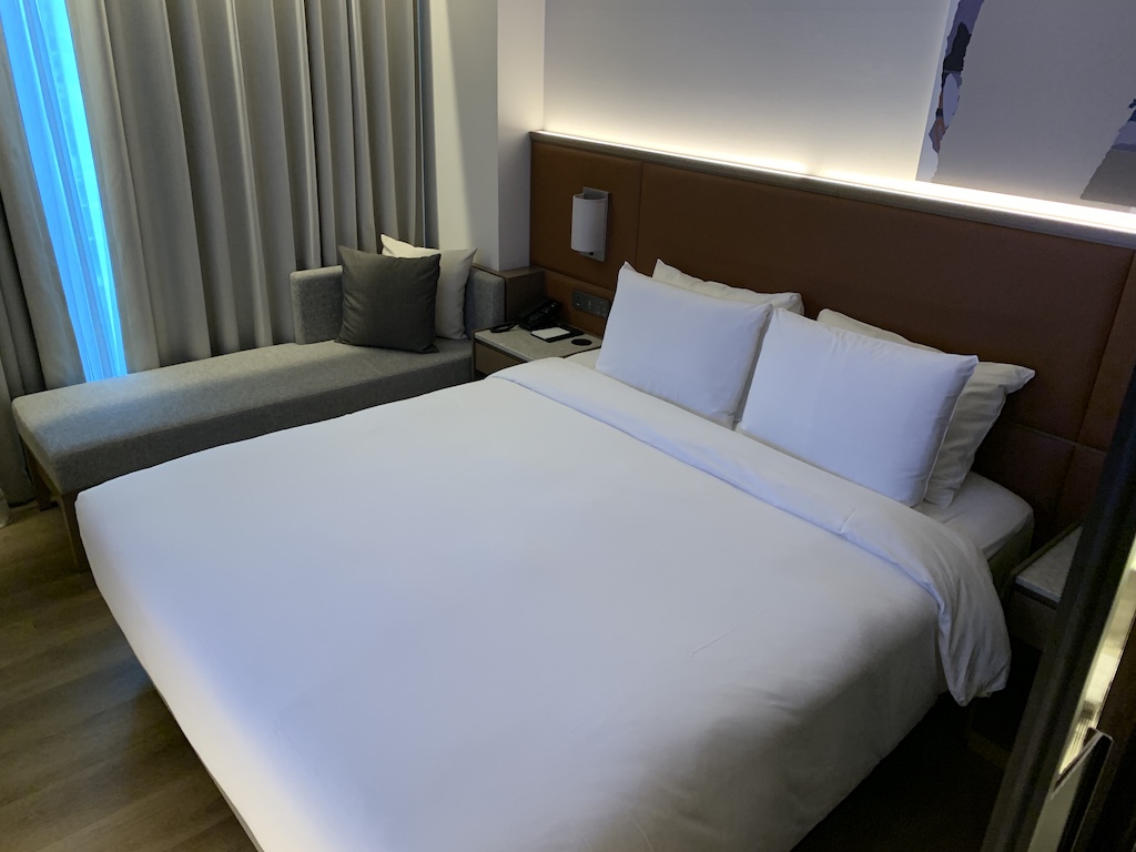 a hotel room with two beds