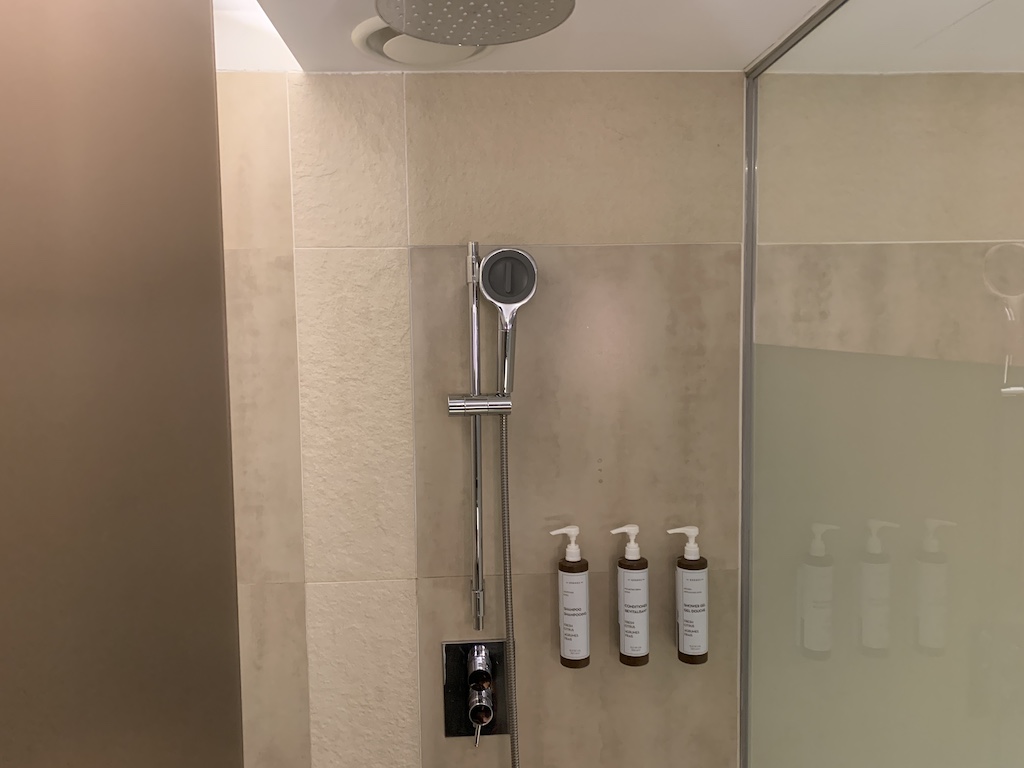 a shower with a glass door