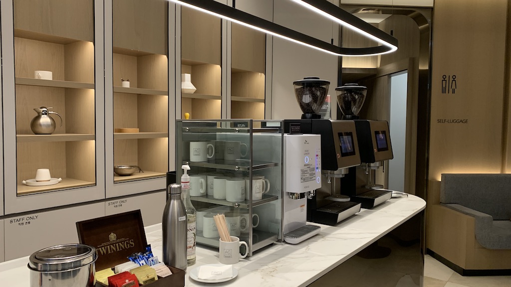 a kitchen with a glass cabinet