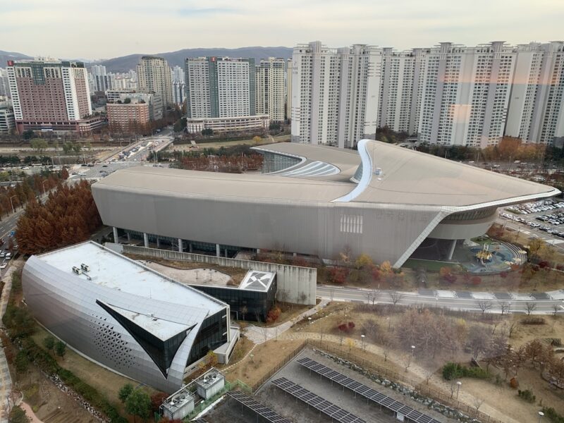 a large building with a curved roof