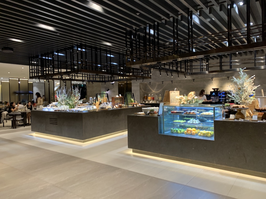 a large room with a large display of fish tanks