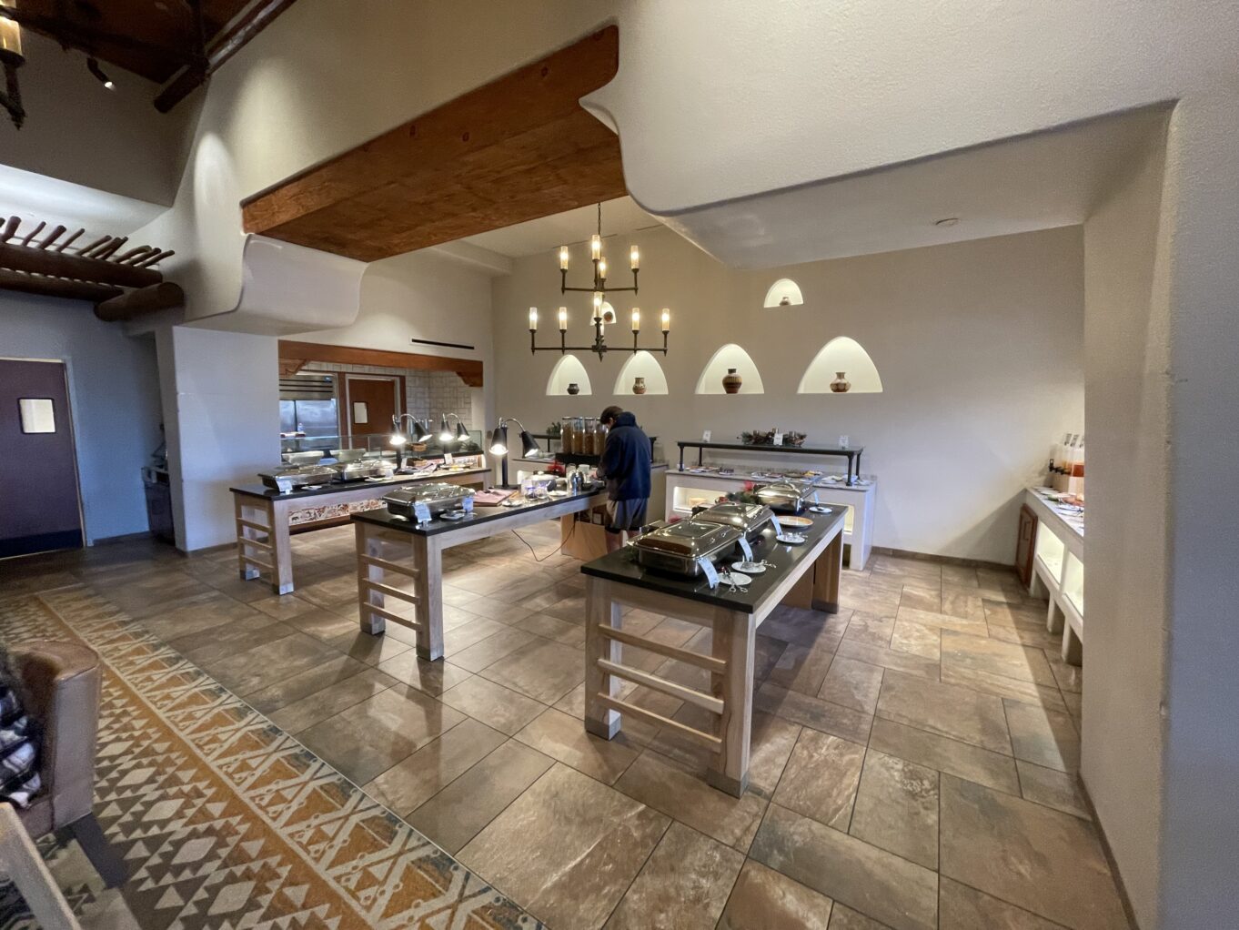 a person standing in a kitchen