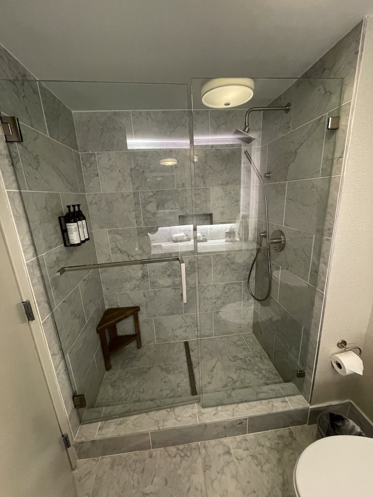 a bathroom with a glass shower