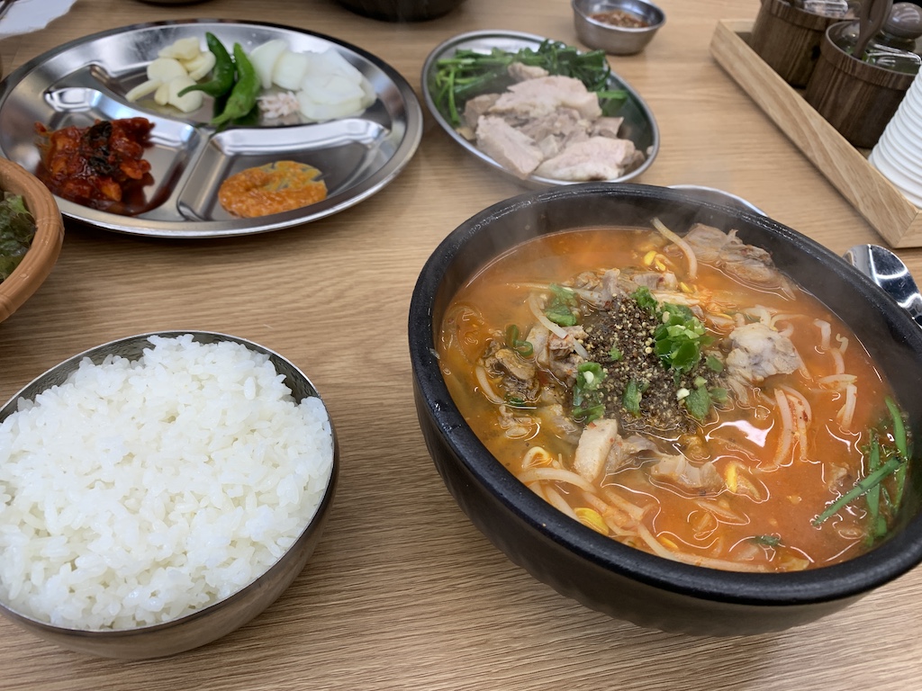 a table with bowls of food