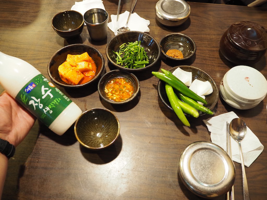 a table with bowls of food