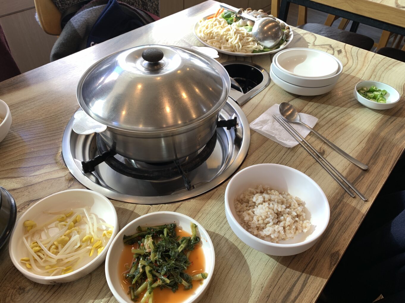 a table with bowls of food