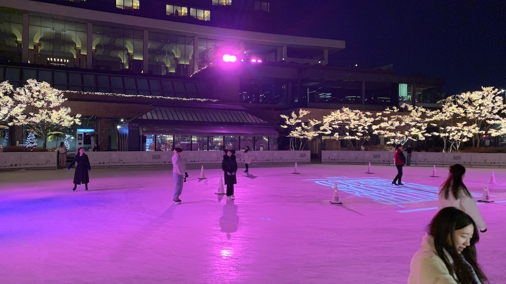 people ice skating on ice