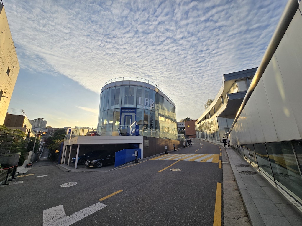 a street with buildings and people