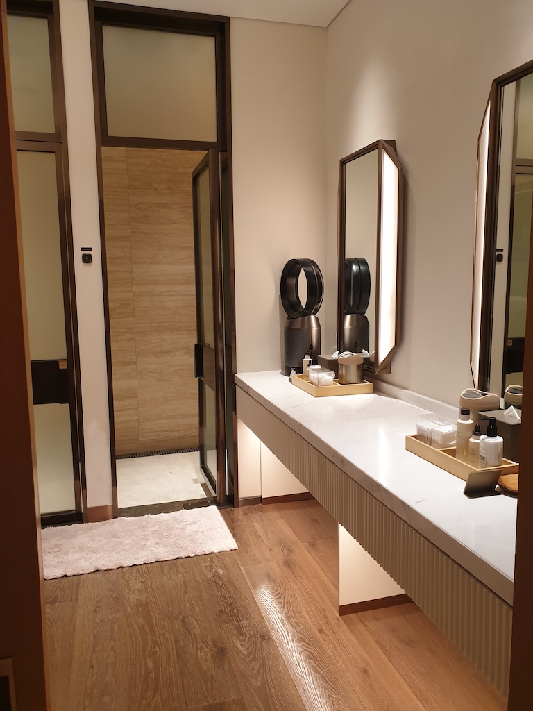 a bathroom with a countertop sink and a mirror