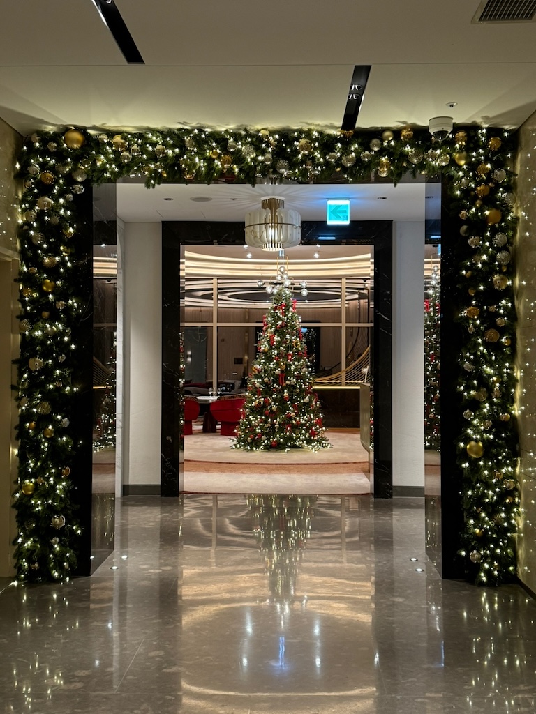 a fireplace with christmas decorations