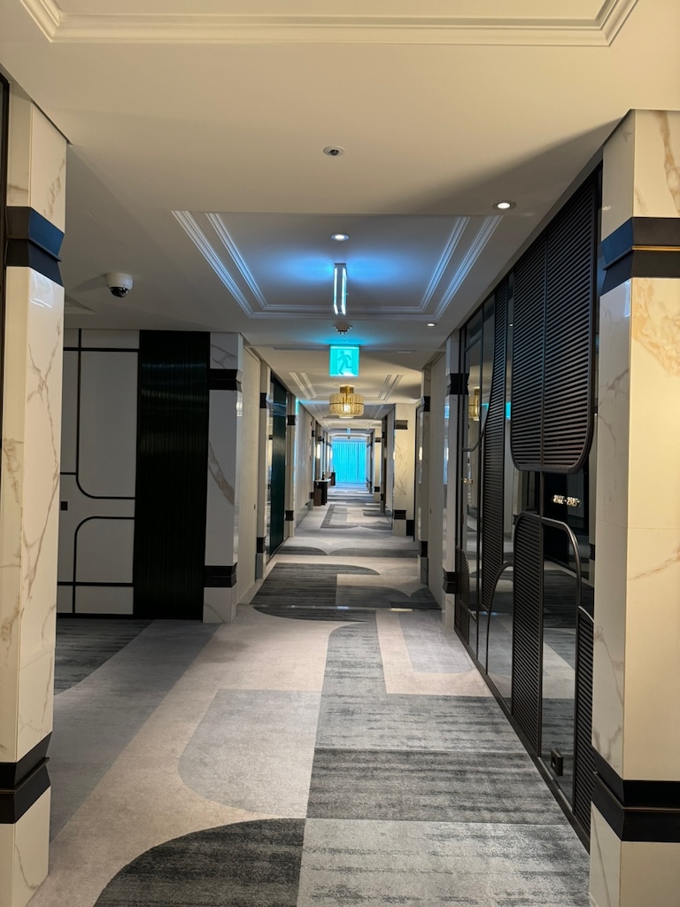 a hallway with computer servers