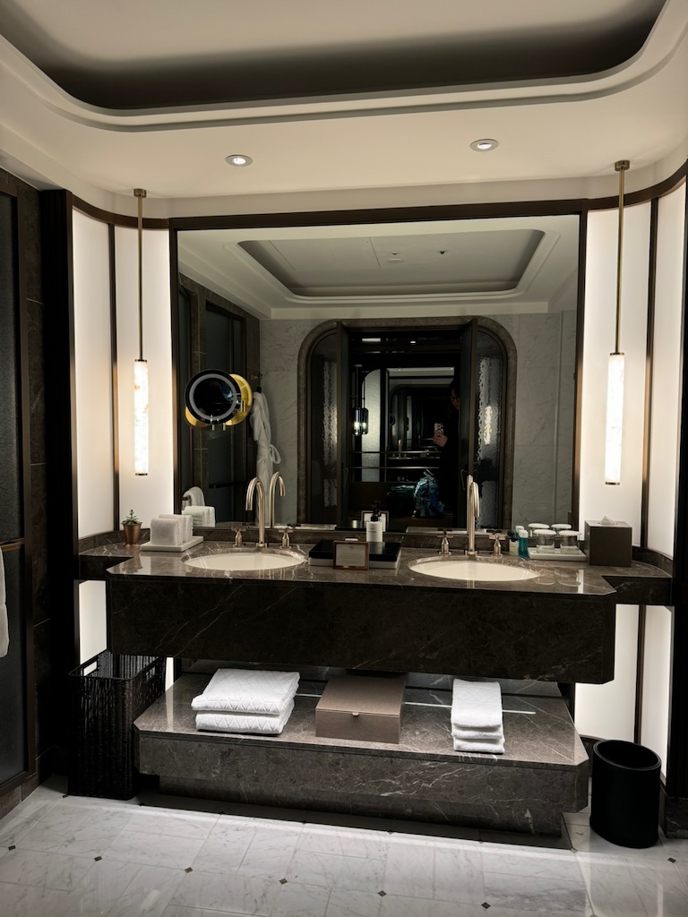 a bathroom with a large mirror